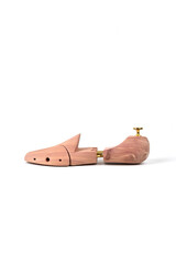 Wooden shoe lasts on a white background.