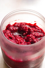 cranberry sauce in glass jar