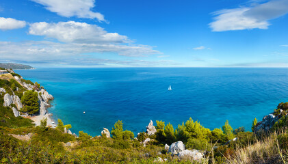 Fototapeta premium Summer sea coast morning landscape, Kassandra peninsula, Halkidiki, Greece. People are unrecognizable. Multi shots stitch panorama.