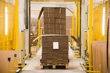 Sheets of cardboard are stacked