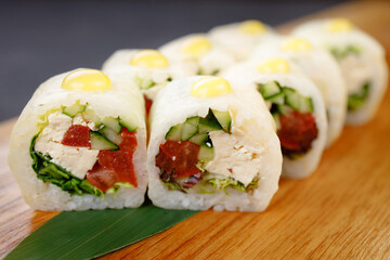 Sushi rolls with vegetables and tofu, vegan food
