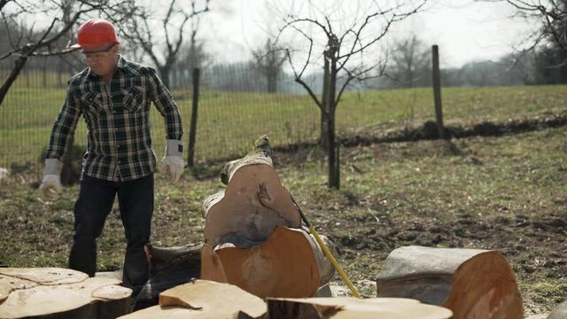 Lumberjack using crowbar