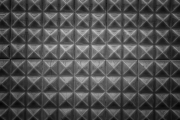 Detail of black and white ceramic wall texture.