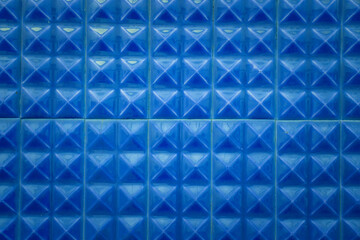 Blue color ceramic texture detail of wall.