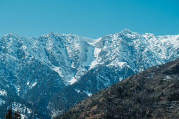 Fototapeta na wymiar View of The Seven Sisters Peak mountains covered by snow as seen from the Solang valley in Manali, Himachal Pradesh, India