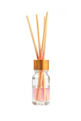 Reed air diffuser isolated on white background. Decorative bamboo sticks in glass bottle