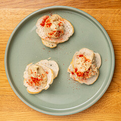 tapas with hummes on the plate