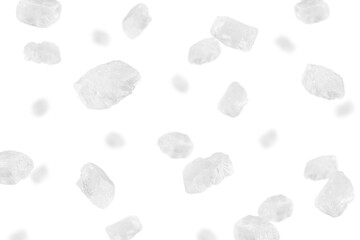 Falling sea salt isolated on white background, selective focus