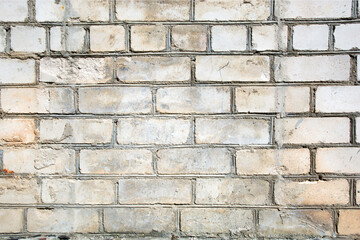  textural background of brick old weathered wall white