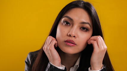 Pretty Asian girl in close-up - studio photography