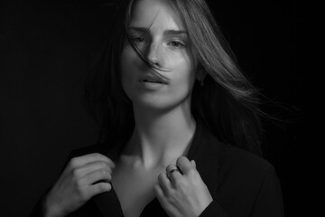 Black and white portrait of a young girl with long hair