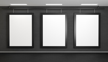 Three images hang on a dark gray concrete wall. Posters template with black frames. 3D rendering mockup for art gallery or cinema.