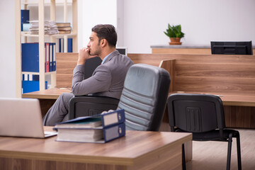 Young businessman employee working in the office