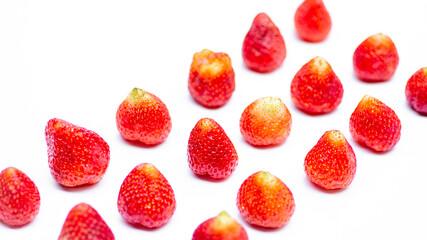 Red strawberries on white background.