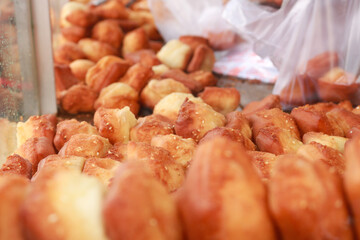 Bolang-baling is fried bread made from wheat flour with good taste, generally sold on the side of the road.