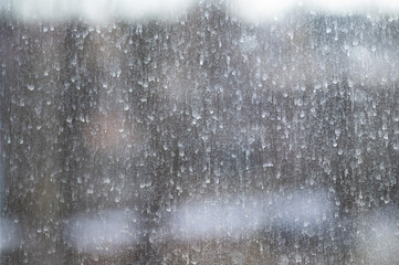 dirty window, focus on dry drops, background out of focus
