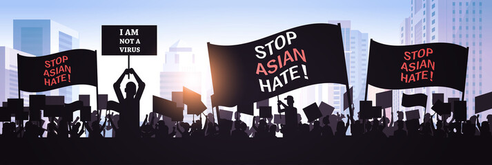 stop asian hate people silhouettes holding banners against racism support during covid-19 coronavirus pandemic