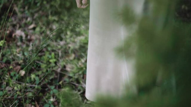 Angel like woman in satin beige waiting for liberation