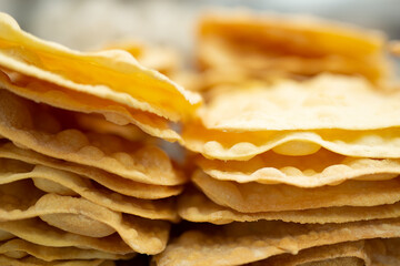 layers of dough for making a cake. The thin crust is crispy.