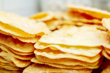 layers of dough for making a cake. The thin crust is crispy.