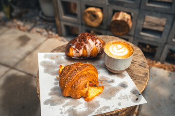 Freshly baked traditional bread on wooden table
