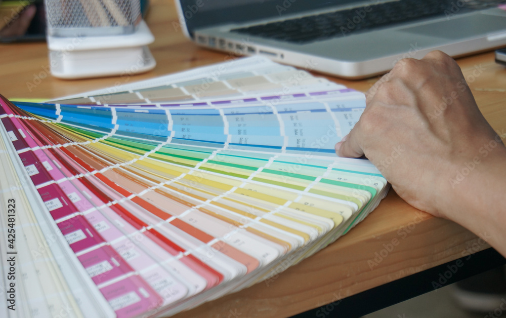 Fototapete Graphic designer working on digital tablet. artist drawing on graphic tablet and Color swatch samples. Artist Creative Designer sketch graphic drawing creative creativity draw studying work on tablet
