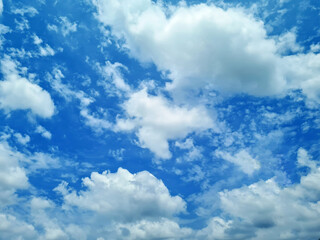Naklejka na ściany i meble Blue sky background with big clouds