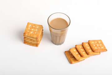 Morning breakfast concept. tea cup and Biscuit on white background.