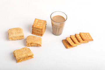 Morning breakfast concept. tea cup and Biscuit on white background.