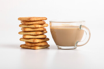 Morning breakfast concept. tea cup and Biscuit on white background.