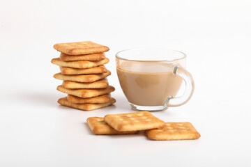 Morning breakfast concept. tea cup and Biscuit on white background.