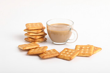 Morning breakfast concept. tea cup and Biscuit on white background.