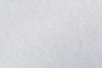 Winter snow. Snow texture Top view of the snow. Texture for design. Snowy white texture. Snowflakes.