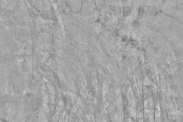 Texture of a old grungy gray concrete wall with cracks as a background or wallpaper