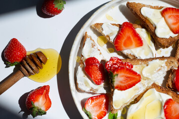 Healthy food breakfast strawberry toast with butter cream