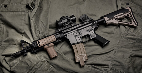 Weapons and military equipment for army, Assault rifle gun (M4A1) on green military uniform...