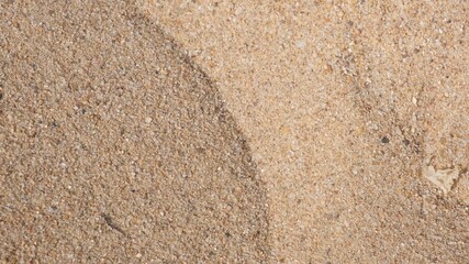 Fototapeta na wymiar sand texture and background. Sand on the beach as background.