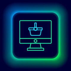 Glowing neon line Computer monitor with shopping basket icon isolated on black background. Online Shopping cart. Supermarket basket symbol. Colorful outline concept. Vector