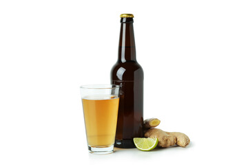 Glass and bottle of ginger beer on white background