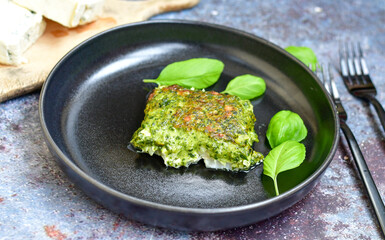 Fish bake refined with  spinach and gorgonzola cheese crust.Ketogenogic diet food