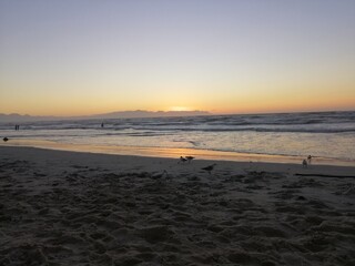 Fototapeta premium muizenberg beach, cape town, 2020/01/01. the first sunrise of 2020