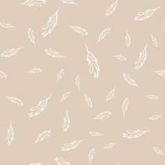 Fototapeta na wymiar Hand-drawn floral background. Vector seamless pattern in doodle style. White leaves on a beige background.
