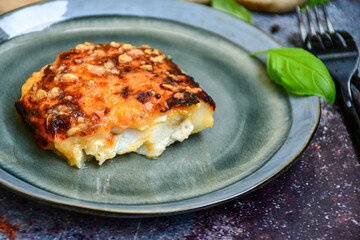  Fish bake preparated in Ticino style  with sweet gorgonzola  cheese and tomato crust