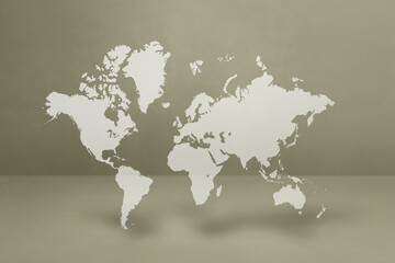 World map on grey wall background. 3D illustration