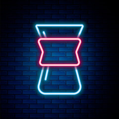 Glowing neon line Pour over coffee maker icon isolated on brick wall background. Alternative methods of brewing coffee. Coffee culture. Colorful outline concept. Vector