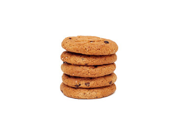 Stack of oatmeal cookies with chocolate pieces isolated on white