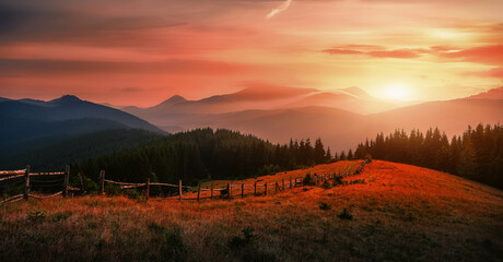 Amazing nature landscape. Vivid nature scenery, mountains hills during sunset. Picture of wild area. Awesome nature Background. Concept of ideal resting place of outdoor. Carpathian mountains. Ukraine