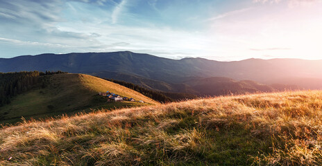 Amazing nature landscape. Vivid nature scenery, mountains hills during sunset. Picture of wild area. Awesome nature Background. Concept of ideal resting place of outdoor. Carpathian mountains. Ukraine