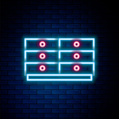 Glowing neon line Chest of drawers icon isolated on brick wall background. Colorful outline concept. Vector