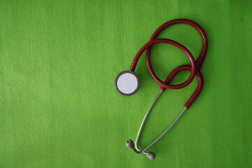 stethoscope on green background